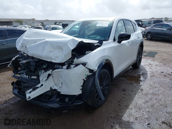 2022 Mazda CX-5 • with VIN JM3KFBAY5N0524251, listed as a IAAI auction lot 41591692 with 28,493 mi miles and . Bid and sale history available at carsss.com. Image 2.