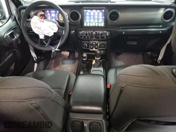 2023 Jeep Wrangler Willys with VIN 1C4HJXDNXPW618044, listed as a Copart auction lot 49214325 with 15,344 mi miles and Salvage title. Bid and sale history available at DreamBid. Image 8.