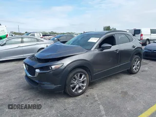2021 Mazda CX-30 Preferred with VIN 3MVDMACLXMM228431, listed as a IAAI auction lot 41575602 with 67,854 mi miles. Bid and sale history available at carsss.com. Image 2.