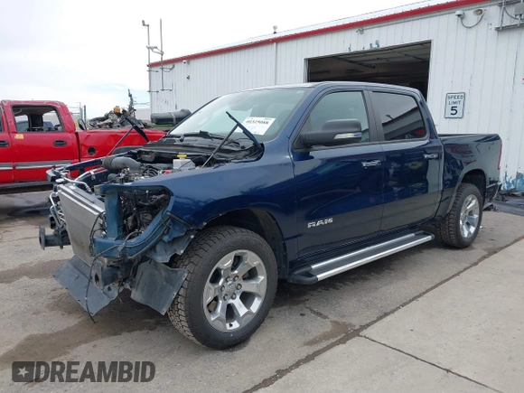 2019 Ram 1500 Big Horn/Lone Star with VIN 1C6SRFFT7KN663677, listed as a IAAI auction lot 40325088 with 77,035 mi miles. Bid and sale history available at carsss.com. Image 23.