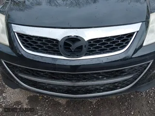 2011 Mazda CX-9 Touring with VIN JM3TB3CV9B0312974, listed as a IAAI auction lot 42129741 with 142,263 mi miles. Bid and sale history available at carsss.com. Image 6.