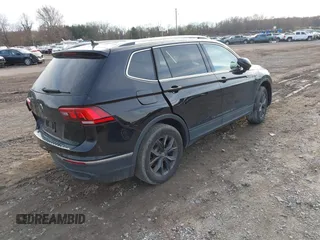 2022 Volkswagen Tiguan SE with VIN 3VV3B7AX8NM163352, listed as a IAAI auction lot 40946586 with 27,847 mi miles and . Bid and sale history available at DreamBid. Image 4.