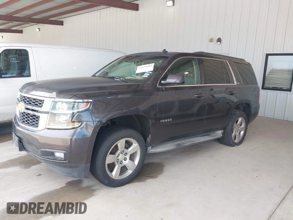2015 Chevrolet Tahoe LT with VIN 1GNSCBKC5FR105437, listed as a IAAI auction lot 42052084 with 348,093 mi miles and . Bid and sale history available at DreamBid. Image 17.