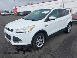 2013 Ford Escape SE with VIN 1FMCU9G93DUA17816, listed as a IAAI auction lot 41688140 with 129,738 mi miles. Bid and sale history available at carsss.com. Image 2.