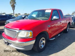 2002 Ford F-150 XL with VIN 1FTRX17W52NA81828, listed as a IAAI auction lot 41450811 with 201,948 mi miles. Bid and sale history available at carsss.com. Image 17.
