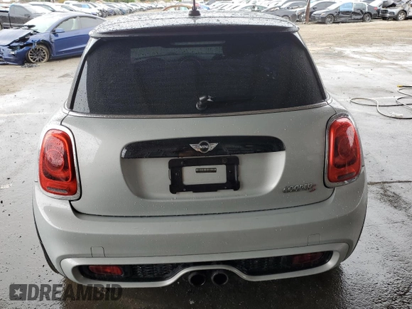 2014 MINI Hardtop S with VIN WMWXM7C57ET985421, listed as a Copart auction lot 49443335 with 76,168 mi miles and Salvage Title. Bid and sale history available at DreamBid. Image 6.