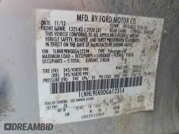 2013 Lincoln MKS with VIN 1LNHL9EK0DG612314, listed as a Copart auction lot 52901685 with 124,828 mi miles and Salvage title. Bid and sale history available at DreamBid. Image 13.