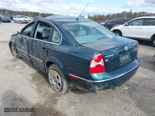 2001 Volkswagen Passat GLX with VIN WVWTH63B51E124484, listed as a IAAI auction lot 42043719 with 42,585 mi miles. Bid and sale history available at carsss.com. Image 3.
