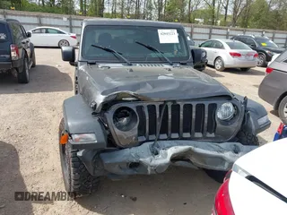 2019 Jeep Wrangler Unlimited Sport S with VIN 1C4HJXDG2KW516571, listed as a IAAI auction lot 42043223 with 58,131 mi miles and . Bid and sale history available at DreamBid. Image 12.