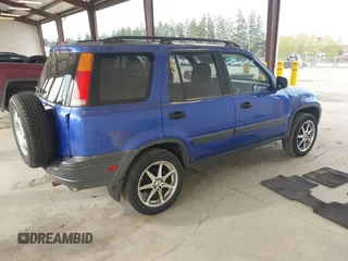 2001 Honda CR-V LX with VIN JHLRD28451C005857, listed as a IAAI auction lot 42004556 with 211,403 mi miles. Bid and sale history available at carsss.com. Image 4.