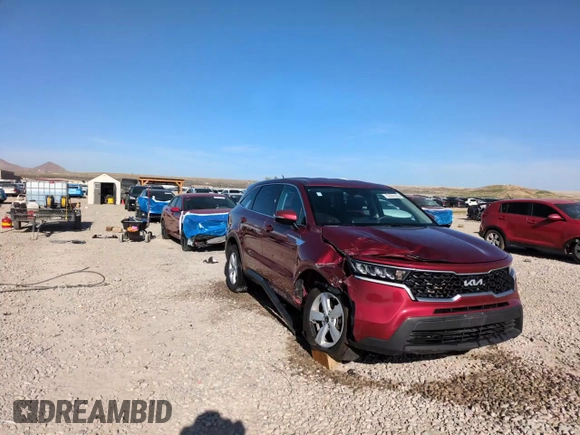 2022 Kia Sorento LX z VIN 5XYRGDLC4NG099777, wystawiony jako Copart lot #52391425 z przebiegiem 111 531 mil mil oraz Szkoda całkowita • Salvage title. Historia ofert i sprzedaży dostępna na DreamBid. Obrazek 13.