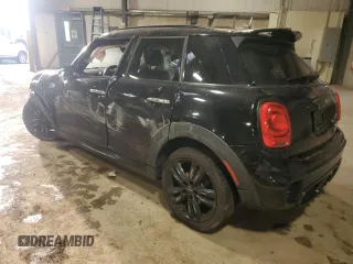 2015 MINI Hardtop 4 Door S with VIN WMWXU3C55F2B62019, listed as a Copart auction lot 46853535 with 124,919 mi miles and Salvage title. Bid and sale history available at DreamBid. Image 2.