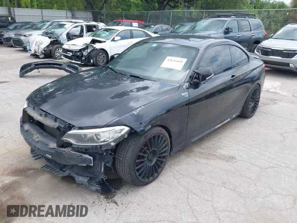 2015 BMW 2 Series M235i with VIN WBA1J7C5XFV289284, listed as a IAAI auction lot 42626668 with 179,944 mi miles and . Bid and sale history available at DreamBid. Image 18.