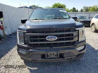 2021 Ford F-150 XL with VIN 1FTFW1E81MFA80456, listed as a Copart auction lot 61268545 with 57,233 mi miles and Salvage title. Bid and sale history available at DreamBid. Image 5.
