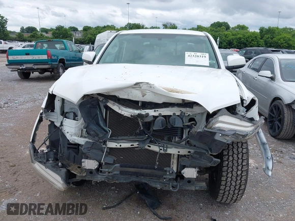 2017 Toyota Tacoma SR5 z VIN 3TMAZ5CN8HM051558, wystawiony jako IAAI lot #42320319 z przebiegiem 101 767 mil mil oraz . Historia ofert i sprzedaży dostępna na DreamBid. Obrazek 6.