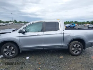2017 Honda Ridgeline RTL with VIN 5FPYK3F52HB019266, listed as a IAAI auction lot 42638081 with 117,004 mi miles and . Bid and sale history available at DreamBid. Image 14.