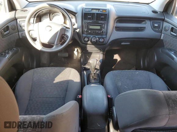 2006 Kia Sportage LX z VIN KNDJF724467197542, wystawiony jako Copart lot #75233464 z przebiegiem 204 570 mil mil oraz Czysty tytuł • Clean title. Historia ofert i sprzedaży dostępna na DreamBid. Obrazek 8.
