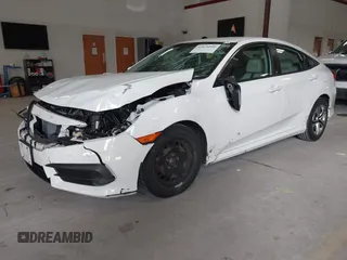 2016 Honda Civic Sedan LX with VIN 19XFC2F59GE028056, listed as a IAAI auction lot 41875940 with 124,243 mi miles. Bid and sale history available at carsss.com. Image 17.