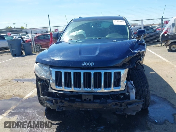 2012 Jeep Grand Cherokee Laredo with VIN 1C4RJFAG0CC160255, listed as a IAAI auction lot 41967809 with 127,702 mi miles. Bid and sale history available at carsss.com. Image 13.