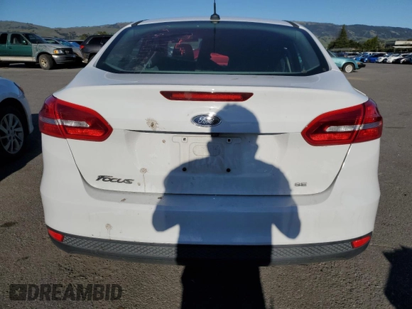 2018 Ford Focus SE with VIN 1FADP3F23JL237482, listed as a Copart auction lot 47798375 with 140,927 mi miles and Salvage Title. Bid and sale history available at carsss.com. Image 6.