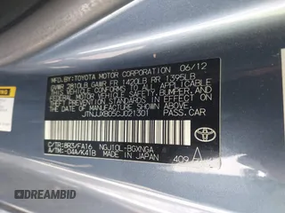 2012 Scion iQ with VIN JTNJJXB05CJ021301, listed as a IAAI auction lot 42323450 with 97,185 mi miles and . Bid and sale history available at DreamBid. Image 9.