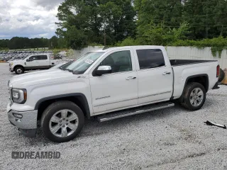 2018 GMC Sierra 1500 SLT z VIN 3GTU2NEC4JG244274, wystawiony jako Copart lot #60001945 z przebiegiem 177 090 mil mil oraz Czysty tytuł • Clean title. Historia ofert i sprzedaży dostępna na DreamBid. Obrazek 1.