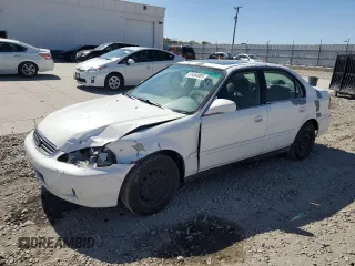 1999 Honda Civic EX z VIN 2HGEJ8541XH556385, wystawiony jako Copart lot #55464005 z przebiegiem 256 495 mil mil oraz Szkoda całkowita • Salvage title. Historia ofert i sprzedaży dostępna na DreamBid. Obrazek 1.