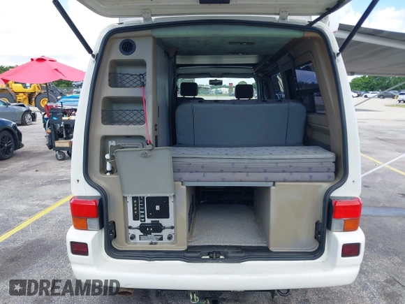 1997 Volkswagen EuroVan CV с VIN WV2EH8705VH077041, выставлен на аукционе IAAI как лот 42481515 с пробегом 144 миль миль и . История ставок и продаж доступна на DreamBid. Изображение 12.