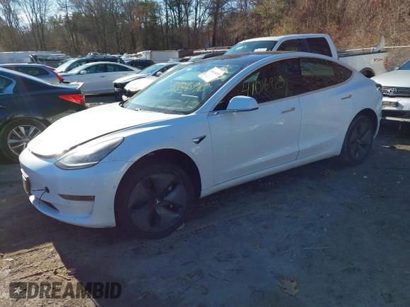 2018 Tesla Model 3 Long Range Battery with VIN 5YJ3E1EB5JF108633, listed as a IAAI auction lot 41016970 with 90,175 mi miles and . Bid and sale history available at DreamBid. Image 19.
