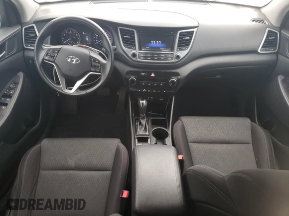 2016 Hyundai Tucson SE z VIN KM8J33A40GU184479, wystawiony jako Copart lot #83184724 z przebiegiem 150 732 mil mil oraz Czysty tytuł • Clean title. Historia ofert i sprzedaży dostępna na DreamBid. Obrazek 8.