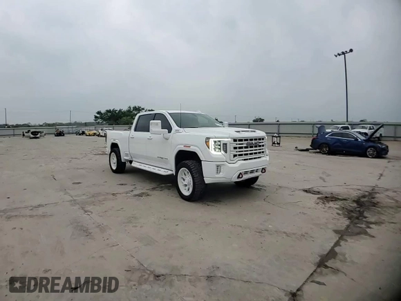 2021 GMC Sierra 2500HD AT4 z VIN 1GT49PEY6MF277074, wystawiony jako Copart lot #49231105 z przebiegiem 77 454 mil mil oraz Czysty tytuł • Clean title. Historia ofert i sprzedaży dostępna na DreamBid. Obrazek 10.