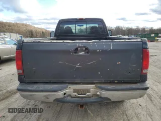 2000 Ford F-250 with VIN 1FTNF21S9YEA14056, listed as a Copart auction lot 80151994 with 165,477 mi miles and Salvage title. Bid and sale history available at DreamBid. Image 6.