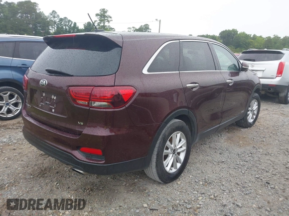 2019 Kia Sorento LX z VIN 5XYPGDA53KG482701, wystawiony jako IAAI lot #42229929 z przebiegiem 161 526 mil mil oraz . Historia ofert i sprzedaży dostępna na DreamBid. Obrazek 4.