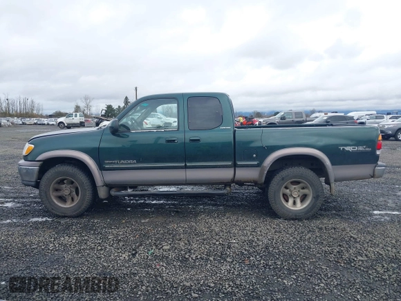 2000 Toyota Tundra Limited with VIN 5TBBT4812YS031675, listed as a IAAI auction lot 41626727 with 257,195 mi miles. Bid and sale history available at carsss.com. Image 14.
