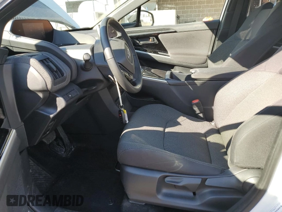 2023 Toyota bZ4X XLE with VIN JTMABABA9PA024814, listed as a Copart auction lot 48112065 with 13,588 mi miles and Salvage Title. Bid and sale history available at DreamBid. Image 7.