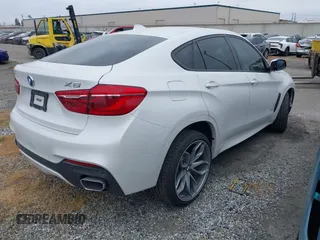 2018 BMW X6 xDrive35i with VIN 5UXKU2C5XJ0X50408, listed as a IAAI auction lot 41798784 with 69,134 mi miles. Bid and sale history available at carsss.com. Image 4.