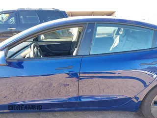 2022 Tesla Model 3 Long Range with VIN 5YJ3E1EB1NF257059, listed as a IAAI auction lot 41329318 with 30,652 mi miles and . Bid and sale history available at DreamBid. Image 14.