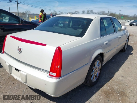2010 Cadillac DTS 1SC z VIN 1G6KD5EY9AU107375, wystawiony jako IAAI lot #41853317 z przebiegiem 170 158 mil mil oraz . Historia ofert i sprzedaży dostępna na DreamBid. Obrazek 4.