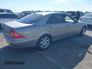 2004 Mercedes-Benz S-Class 4.3L with VIN WDBNG83J14A406775, listed as a IAAI auction lot 41442333 with 77,463 mi miles. Bid and sale history available at carsss.com. Image 4.