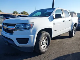 2019 Chevrolet Colorado 2WD Work Truck with VIN 1GCGSBEA1K1115077, listed as a IAAI auction lot 41653601 with 92,537 mi miles and . Bid and sale history available at DreamBid. Image 2.