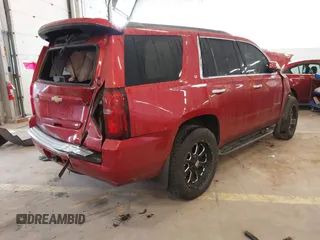2015 Chevrolet Tahoe LT with VIN 1GNSKBKC9FR224692, listed as a IAAI auction lot 41922047 with 138,816 mi miles and . Bid and sale history available at DreamBid. Image 4.