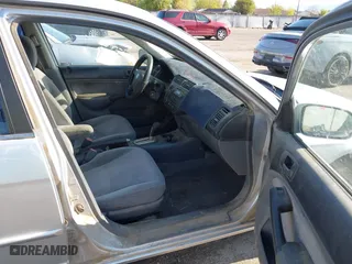 2001 Honda Civic EX with VIN 2HGES26771H512949, listed as a IAAI auction lot 42020043 with 299,833 mi miles. Bid and sale history available at carsss.com. Image 5.