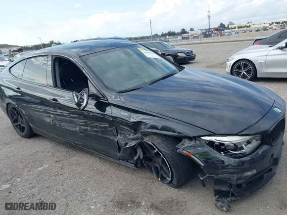 2014 BMW 3 Series Gran Turismo 335i xDrive with VIN WBA3X9C58ED153467, listed as a IAAI auction lot 41609246 with 219,204 mi miles. Bid and sale history available at carsss.com. Image 6.