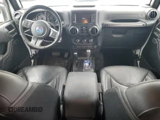 2018 Jeep Wrangler Unlimited Sahara with VIN 1C4BJWEG2JL851277, listed as a Copart auction lot 63631645 with 83,851 mi miles and Salvage title. Bid and sale history available at DreamBid. Image 8.