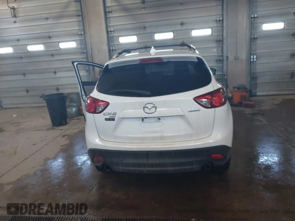 2013 Mazda CX-5 Grand Touring with VIN JM3KE4DE1D0159632, listed as a IAAI auction lot 41524272 with 99,479 mi miles. Bid and sale history available at carsss.com. Image 16.