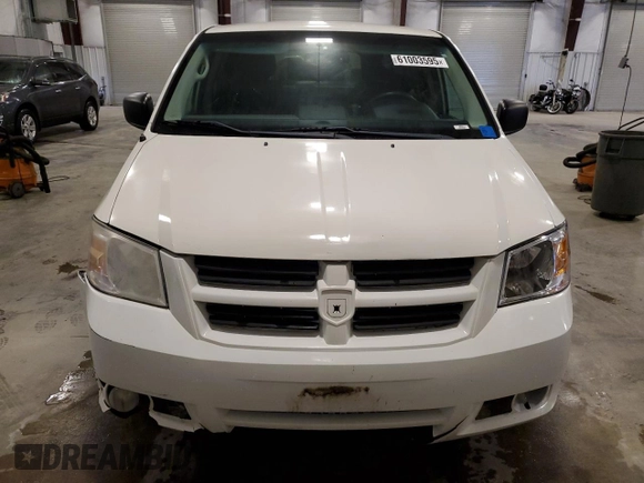 2009 Dodge Grand Caravan SE z VIN 2D8HN44E99R542025, wystawiony jako Copart lot #61003595 z przebiegiem 222 476 mil mil oraz Szkoda całkowita • Salvage title. Historia ofert i sprzedaży dostępna na DreamBid. Obrazek 5.