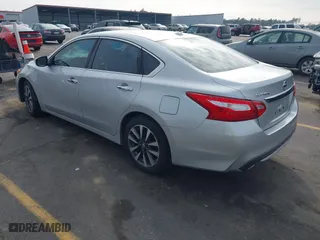 2017 Nissan Altima 2.5 SR with VIN 1N4AL3AP9HC189000, listed as a IAAI auction lot 41491223 with 149,013 mi miles. Bid and sale history available at carsss.com. Image 3.