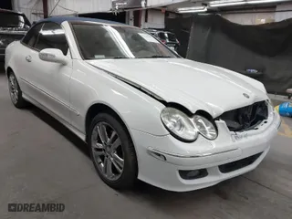 2007 Mercedes-Benz CLK-Class 3.5L with VIN WDBTK56G37T077753, listed as a IAAI auction lot 41435009 with 147,450 mi miles. Bid and sale history available at carsss.com. Image 1.