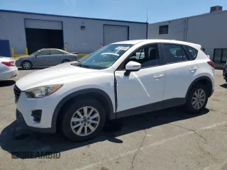 2016 Mazda CX-5 Sport z VIN JM3KE2BYXG0793088, wystawiony jako Copart lot #65778885 z przebiegiem 130 197 mil mil oraz Szkoda całkowita • Salvage title. Historia ofert i sprzedaży dostępna na DreamBid. Obrazek 1.