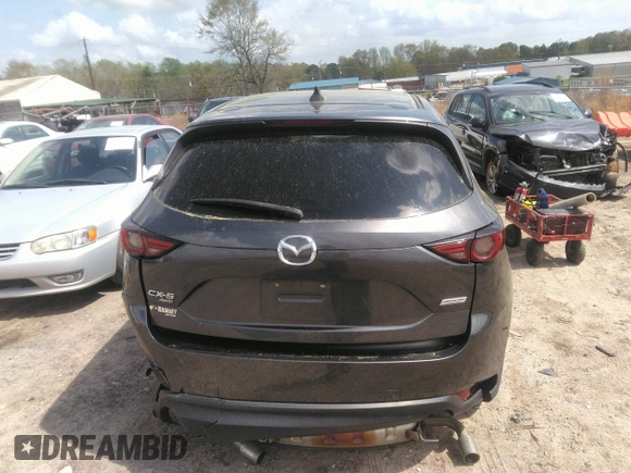 2019 Mazda CX-5 Grand Touring with VIN JM3KFBDM7K0606860, listed as a IAAI auction lot 41936338 with 93,057 mi miles. Bid and sale history available at carsss.com. Image 16.